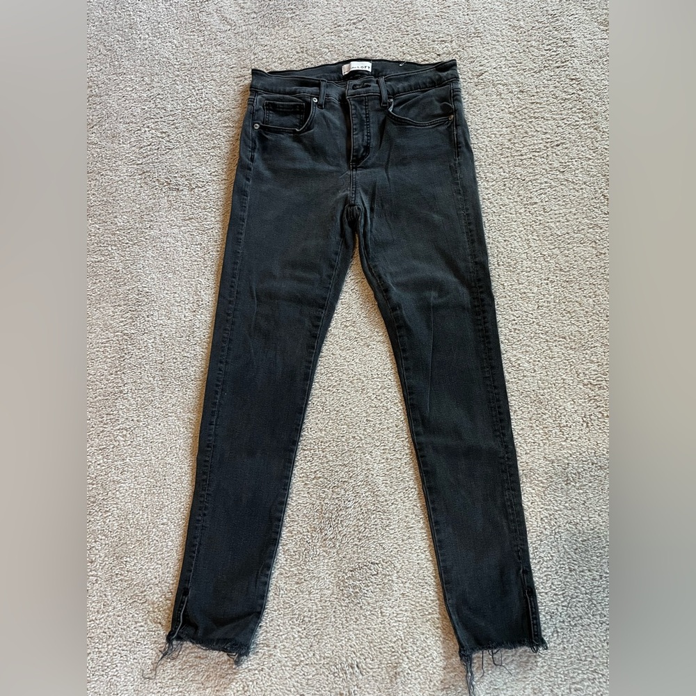 Washed black skinny jeans from Loft. Size 26/2